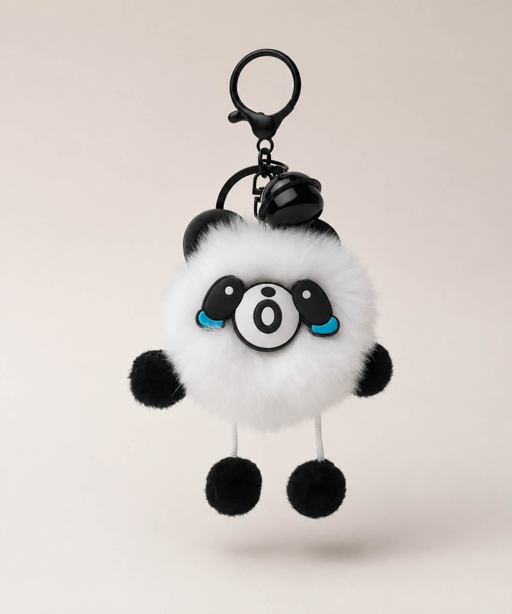 Panda plush keychain with black and white fluffy body, cute crying face, bell charm and black clip